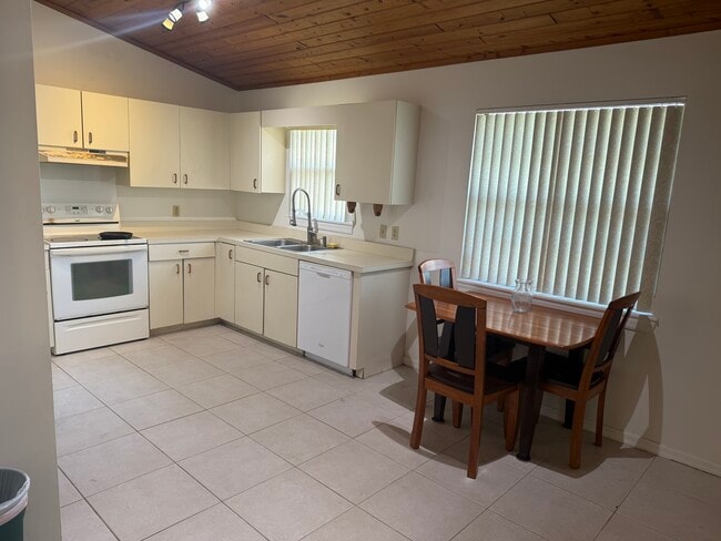 The eat-in kitchen is big enough for two cooks and others to gather. - 6425 5th St