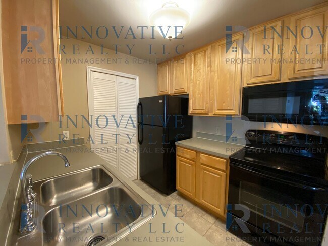 Building Photo - 2BD/2BA First Floor Condo with Private Patio!