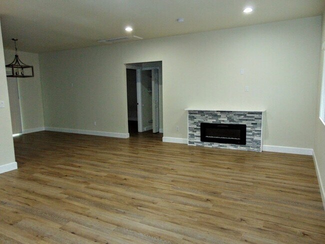 Photo - Private EV Charging in Beautiful 3 Bedroom... House