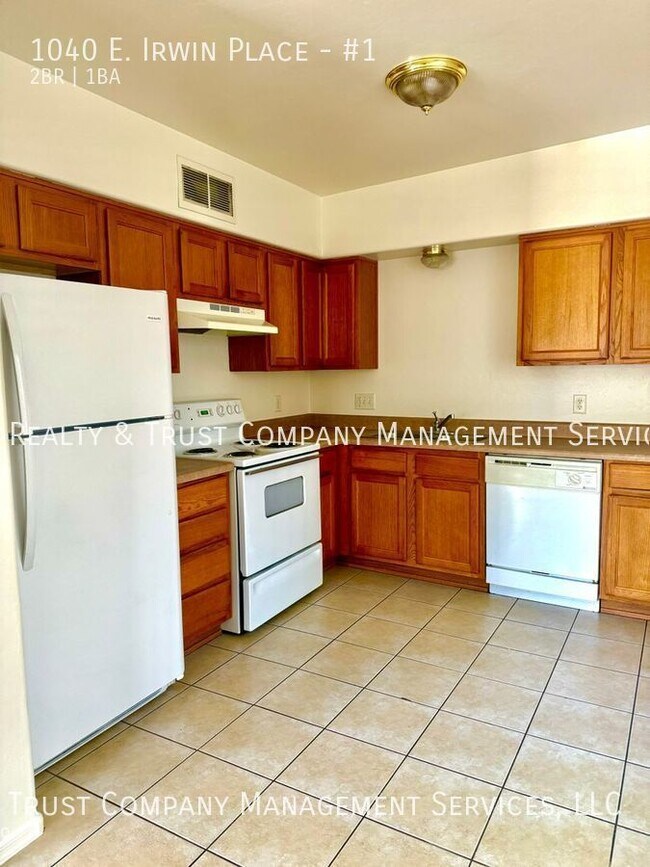 Building Photo - Centrally Located Duplex w/Tile Floors
