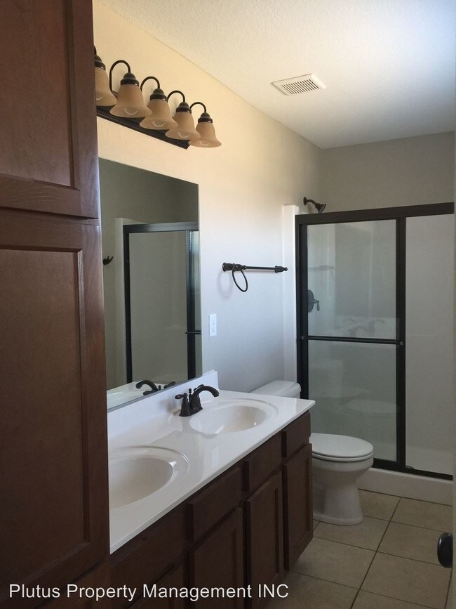 Building Photo - 15002-15006 W 64th Terrace