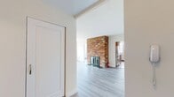 This well-appointed 960 square foot apartment in New York City offers a blend of comfort and style. The space boasts four bedrooms, including a generous 200 square foot primary bedroom, and two full bathrooms. The living areas feature light-colored wood flooring throughout, creating a bright and airy ambiance. Large windows in the living room and bedrooms flood the space with natural light and provide stunning city views.

The modern kitchen is equipped with stainless steel appliances, wooden cabinetry, and dark countertops, offering both functionality and aesthetic appeal. A brick accent wall with a fireplace adds character to the living area, creating a cozy focal point.

The bathrooms are tastefully designed with neutral-toned tiles, contemporary fixtures, and ample storage space. The apartment's layout includes two hallways for easy navigation between rooms. The overall design emphasizes clean lines and a neutral color palette, allowing for versatile decorating options.

Located at 410 East 34th Street in New York, this single-story apartment combines urban living with comfort and style, making it an ideal residence in the heart of the city.