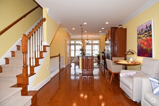 Open kitchen and living room (paint has been updated) - 451 N George Mason Dr