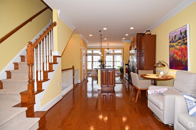 Open kitchen and living room (paint has been updated) - 451 N George Mason Dr