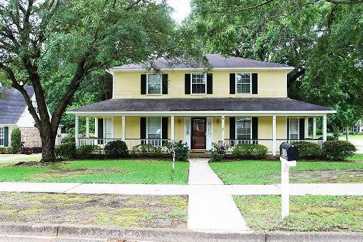 Primary Photo - 2 Story Yellow house on corner lot