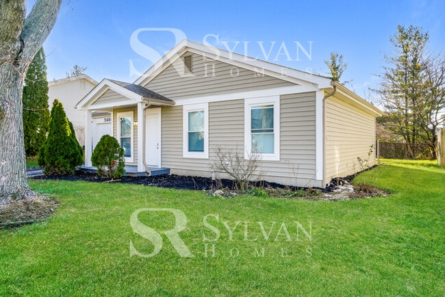 Building Photo - Cute, cozy and comfortable