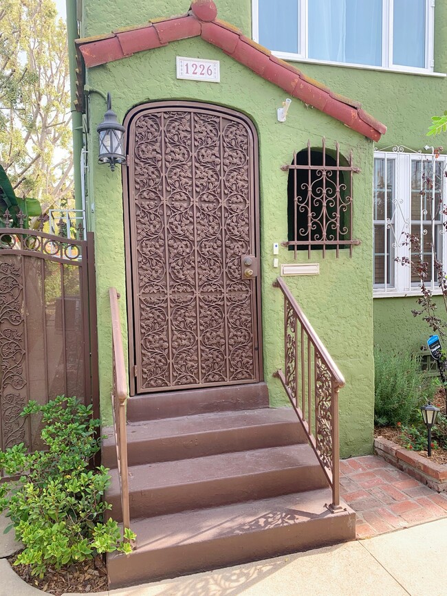 Steel security front door - 1226 S Highland Ave