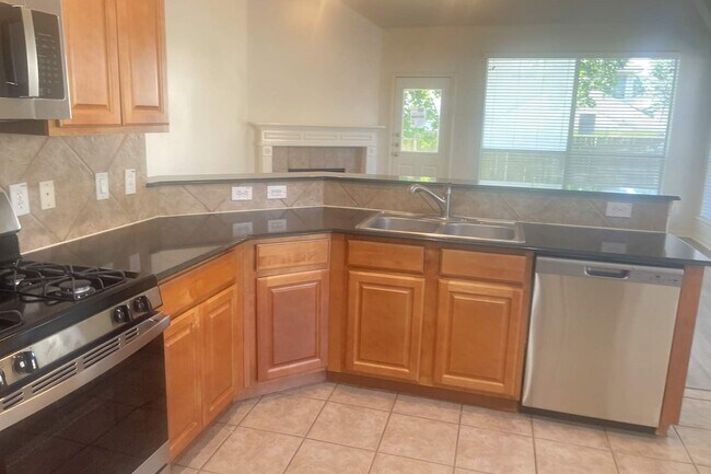 Foto del edificio - 8903 Rolling Rapids Rd