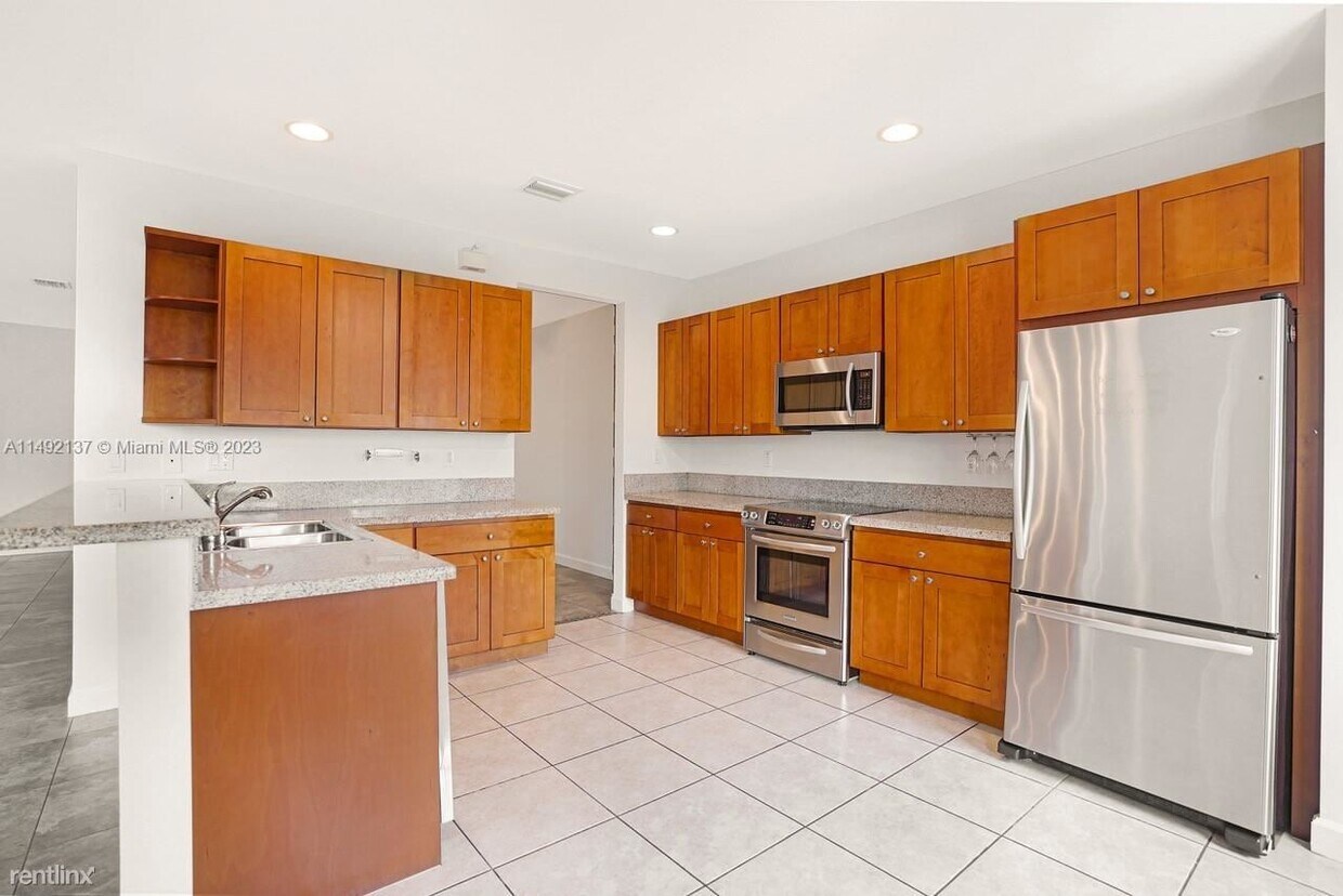 Primary Photo - 4 br, 3.5 bath House - 7418 NW 108th Path