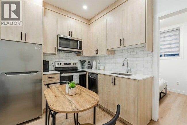 Photo du bâtiment - 1313-1320 20 Ave NW