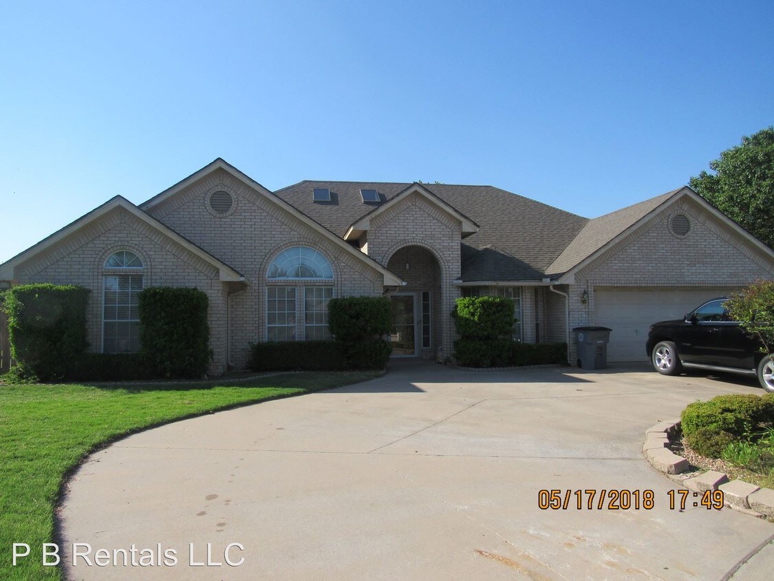 Foto principal - 4 br, 3 bath House - 6807 NW Faircloud Drive