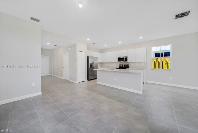 Foto del edificio - 3 br, 2.5 bath Townhome - 2373 NW 130th St...