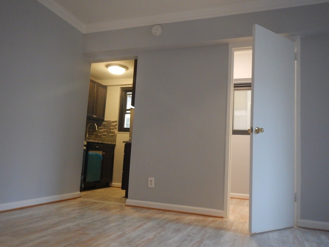 living space with walk-in closet - 2141 I St NW