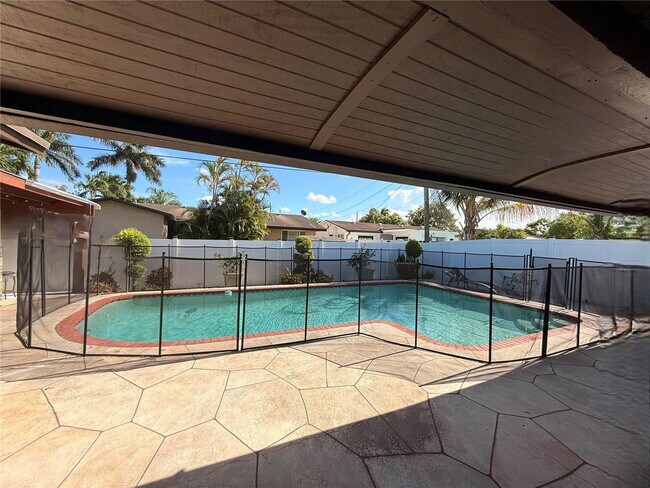 Photo - 11450 Northwest 30th Place, Sunrise, FL 33323 - 4 BR 2 BA single-family home