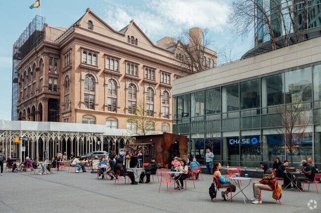 New Yorkers are often seen enjoying food at Astor Place.