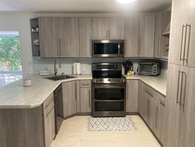 Foto del edificio - 9859 Leeward Ave