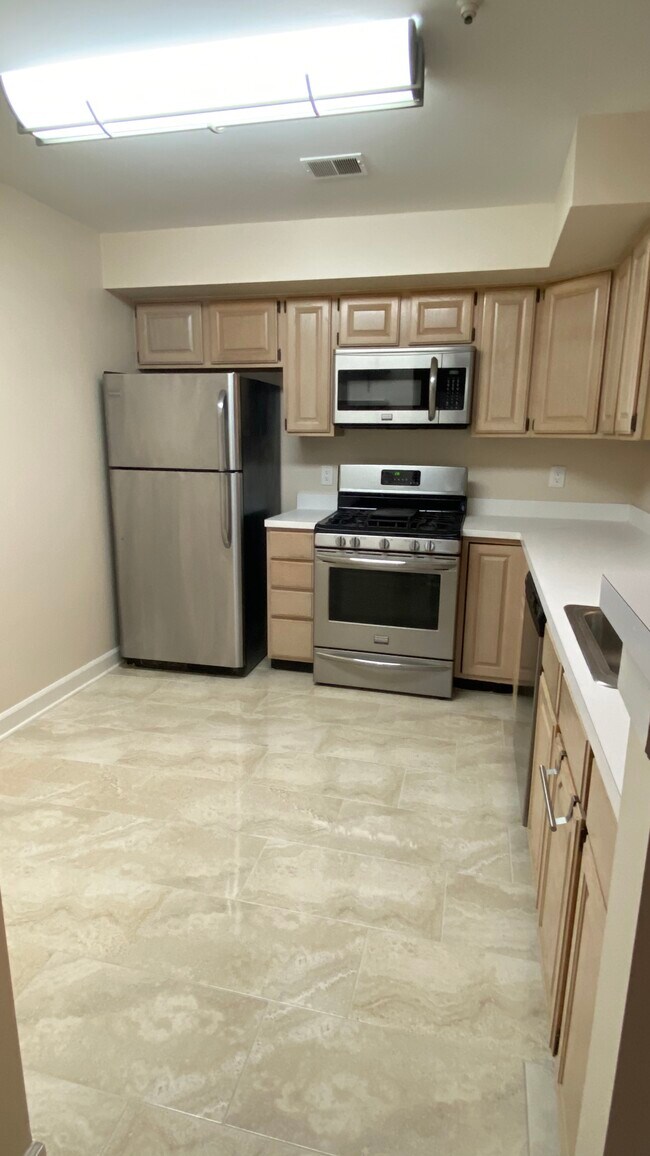 Kitchen with Brand New Floor - 12229 Fairfield House Dr