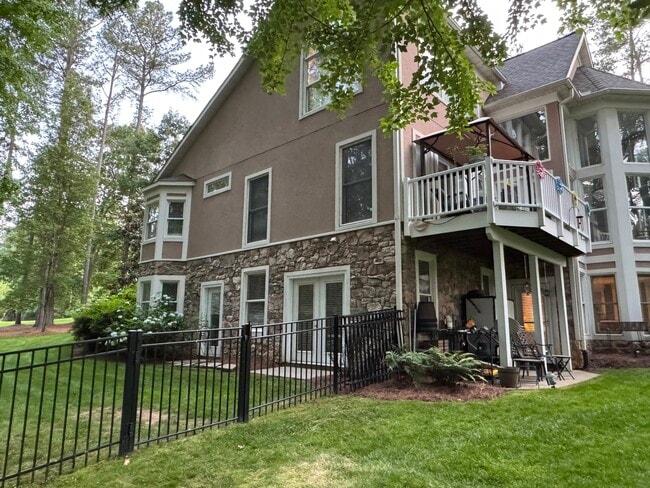 Rear and Side; multiple basement entries - 11607 Fawn Lake Pky