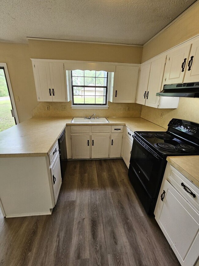 Building Photo - BELOW MARKET RENT!