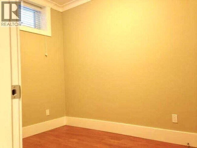 Photo du bâtiment - 8XX W 61st Ave