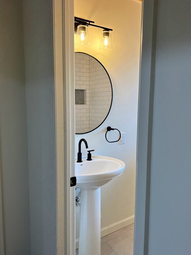 View into main level bathroom - 6215 S Sterne Pky