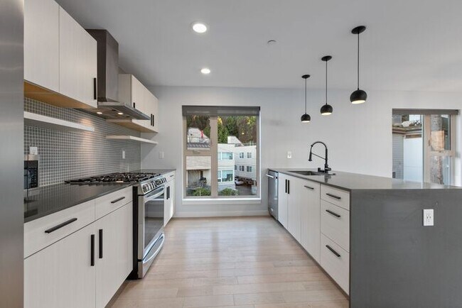 Building Photo - Stunning Air Conditioned Alki Condo Overlooking Majestic Puget Sound!