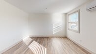 Located at 747 Pontiac Ave in Cranston, Rhode Island, this thoughtfully designed one-bedroom, one-bathroom unit offers a clean, modern aesthetic across a single floor. Light-toned walls and wood-style plank flooring run throughout, creating a cohesive and bright interior. The open living and dining area benefits from multiple windows that invite generous natural light, and a wall-mounted mini-split unit provides efficient climate control. The kitchen is well-equipped with light maple cabinetry, white countertops, a stainless steel sink with a matte black faucet, and a full suite of stainless steel appliances including a refrigerator, dishwasher, range, and over-the-range microwave. The bedroom is a comfortable, well-lit space featuring its own mini-split unit and windows overlooking the surroundings. The full bathroom is finished with warm wood-toned cabinetry, a white countertop vanity, and a glass-enclosed walk-in shower. Additional conveniences include a dedicated closet and an in-unit laundry area, making this a fully functional and efficiently organized living space.