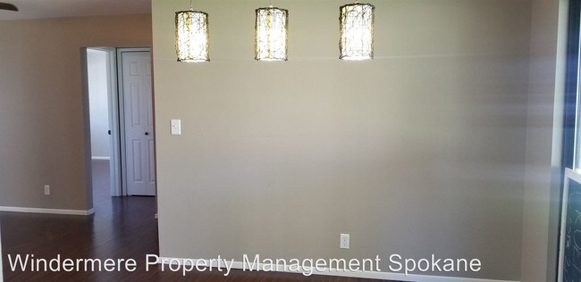 Building Photo - 9511-9513 E Upriver Dr