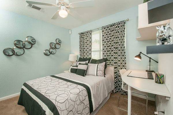 Bedroom, bed is lifted off floor. - 1250 Sadler Drive