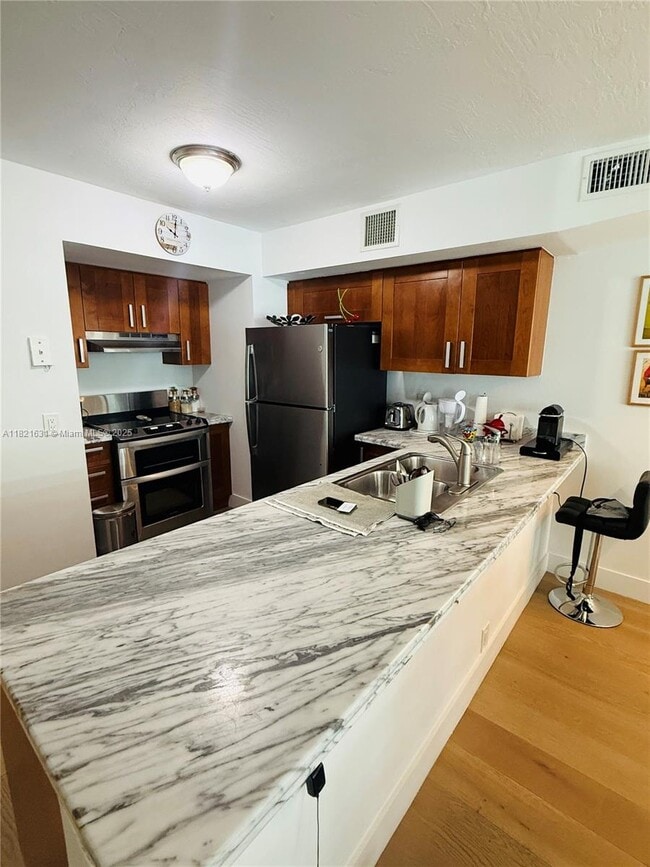 Building Photo - 9499 Collins Ave