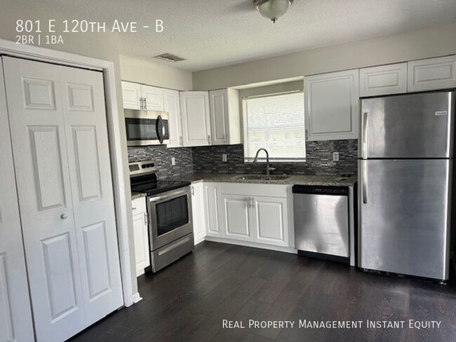 Building Photo - 801 E 120th Ave