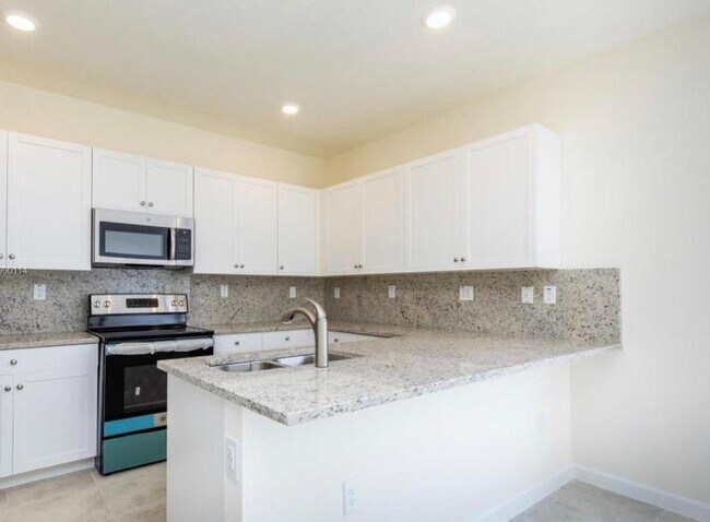Building Photo - 10575 W 33rd Way