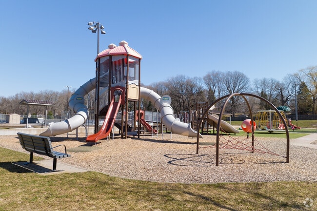 This Large Playground is one of the Many Amenities in Plymouth Creek Park.