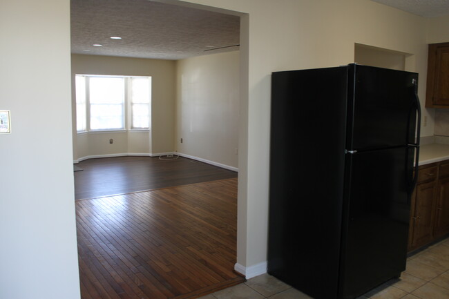 View from kitchen to main entrance - 7824 Emilys Way