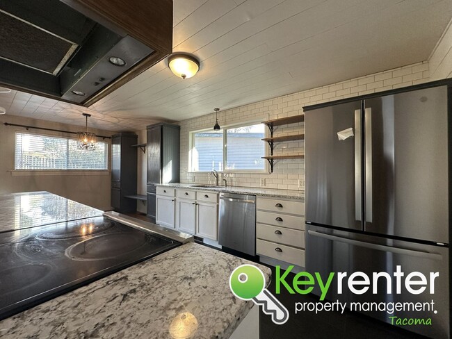 Building Photo - Welcome Home to Serenity in the Heart of T...