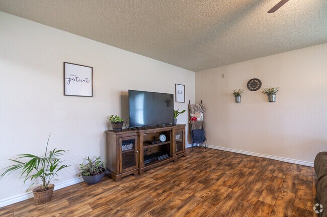 Sala de estar - Country Village Apartments