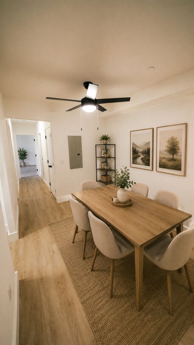 Furnished Dining Area with ceiling fan - Southgate Gardens Apartments