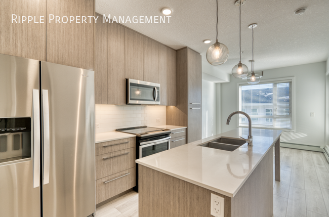 Photo du bâtiment - AMAZING MODERN 1 BED/ 1 BATH CONDO