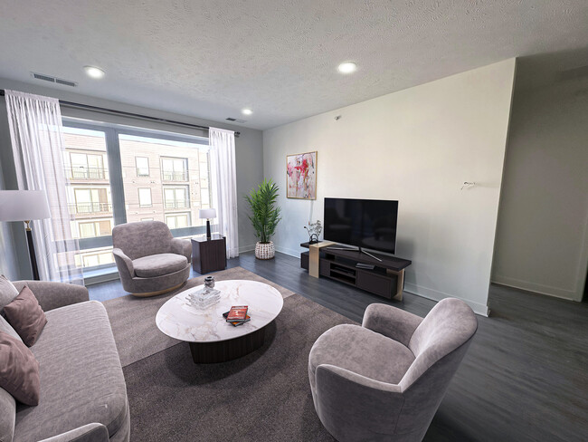 Sala de estar de Square Apartments en Midtown, Omaha - Square Apartments