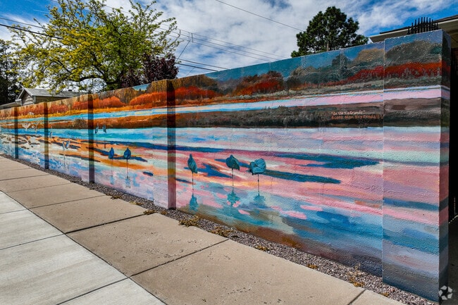Scott Alan Kuykendall paining "On the Rio Grande" found on a wall in Stardust Skies Park.