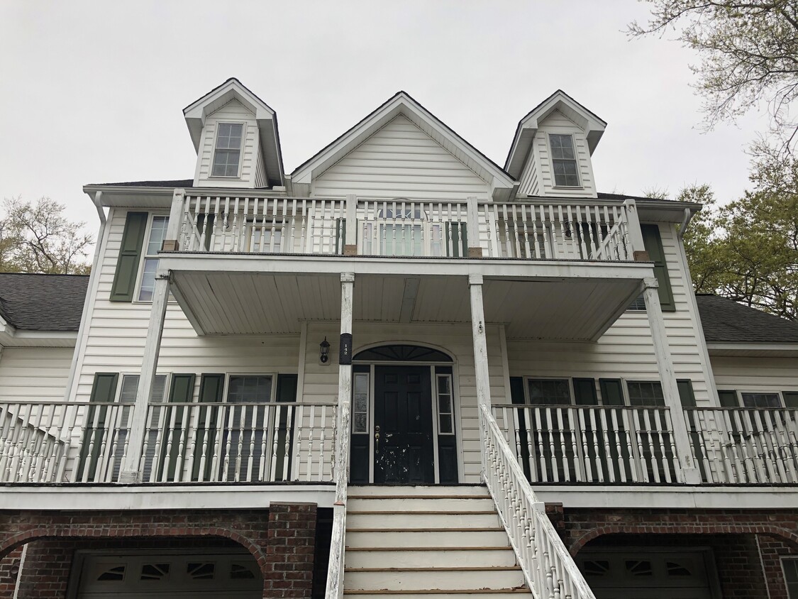 Front side view of 142 Oyster Point Row - 142 Oyster Point Row