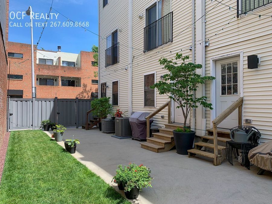 Primary Photo - Three Bed Washington Square West Townhome