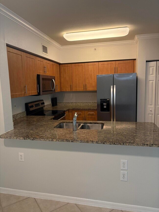Foto del edificio - 6434 Emerald Dunes Dr