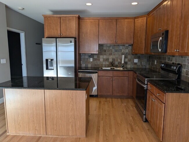 Building Photo - Chic Urban Living: Spacious 2-Bed Condo in Denver with 2 Reserved Garage Spaces!