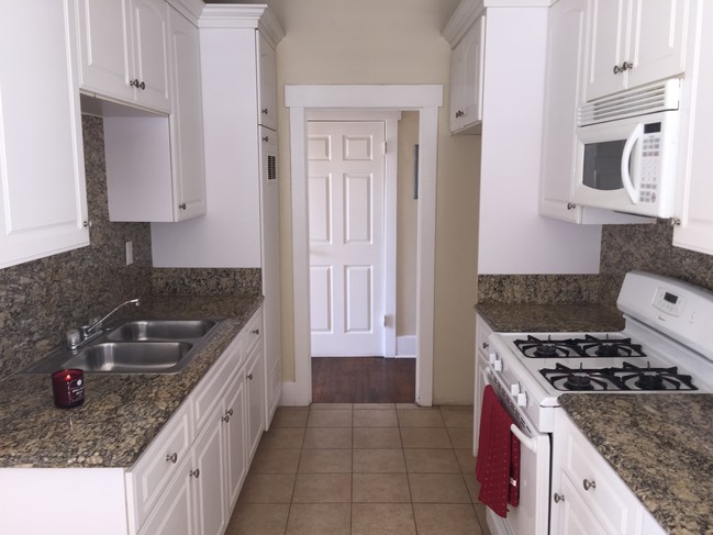 Kitchen facing front door - 261 Parke St