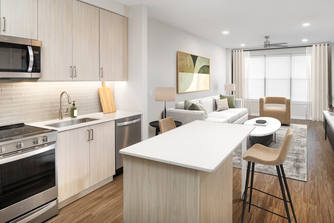 Upgrade Collection kitchen, living, and dining areas with hard-surface vinyl plank flooring - Avalon Wayne