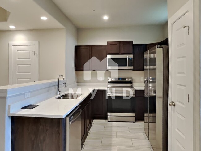 Building Photo - 8426 Via Verona Unit 103