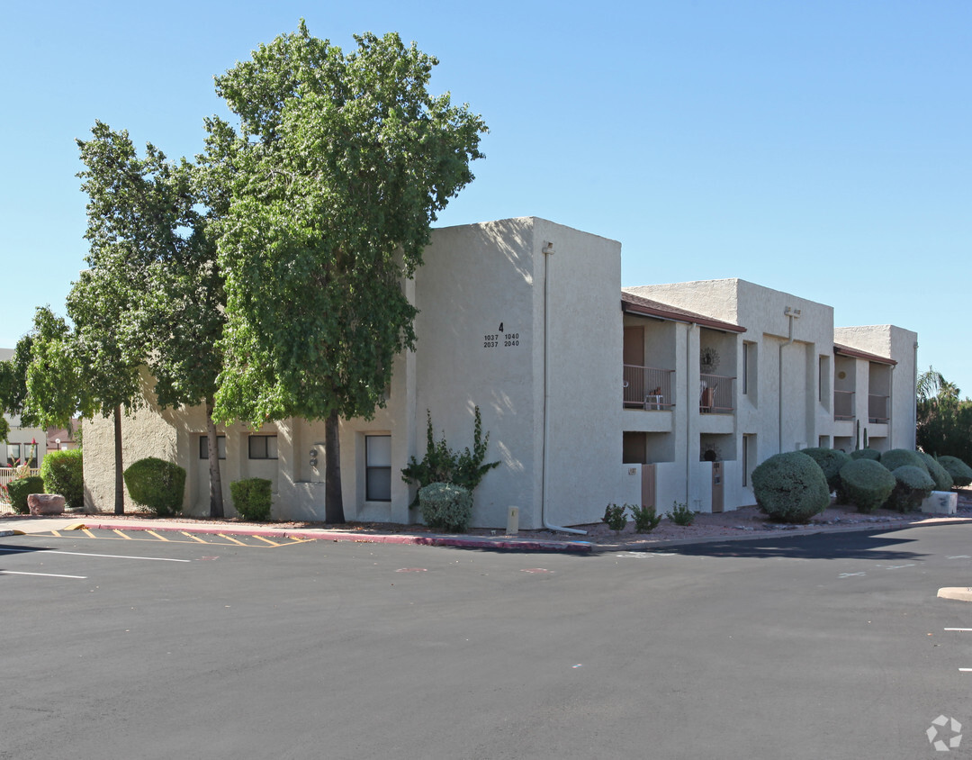 Building Photo - Village At Apache Wells