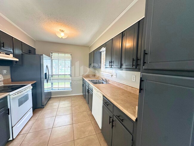 Foto del edificio - 9730 Trailwood Dr S