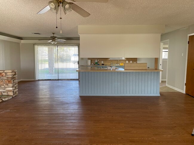 Living area, looking to kitchen and dining room on the left - 10570 San Marcos Hwy